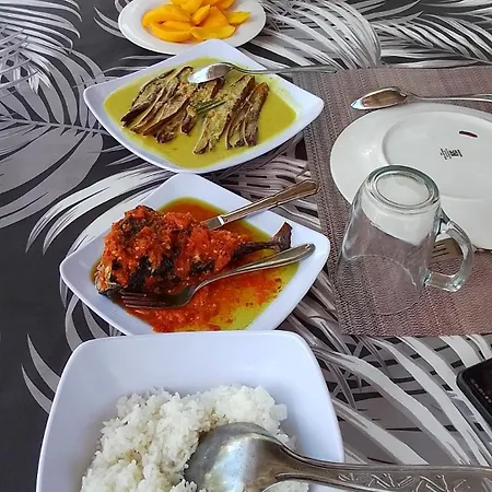 Naca Homestay Manado Exterior foto